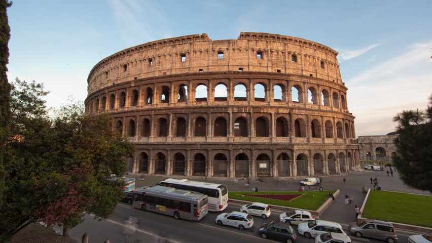 A time-lapse of the Colosseum and street traffic