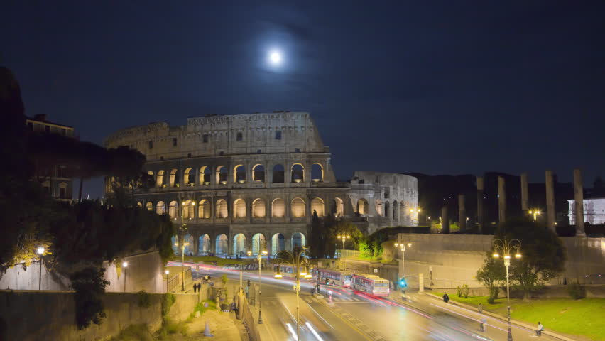 Moonlit time-lapse of the Colosseum and street traffic