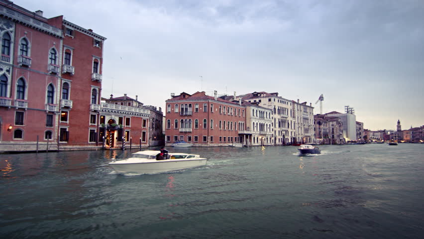 Tracking footage of buildings on the waterline of the Grand Canal