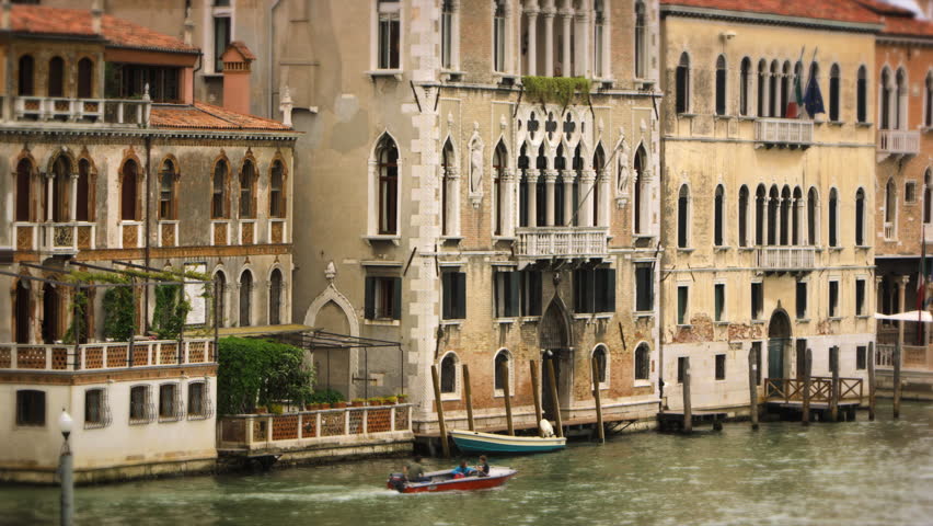 Boat passing by buildings in Venice