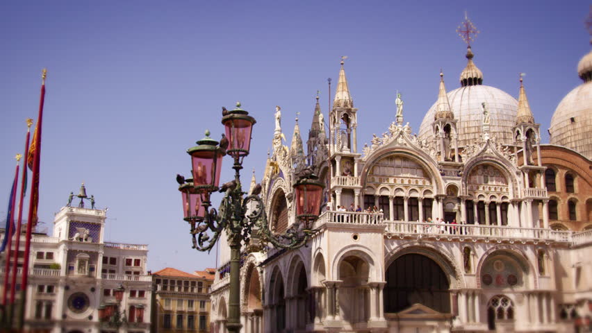 Slow motion, panning shot of Basilica San Marco