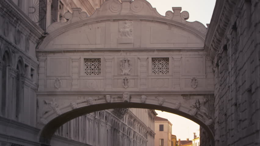 Panning down from the bridge of Sighs to the canal and a gondola below
