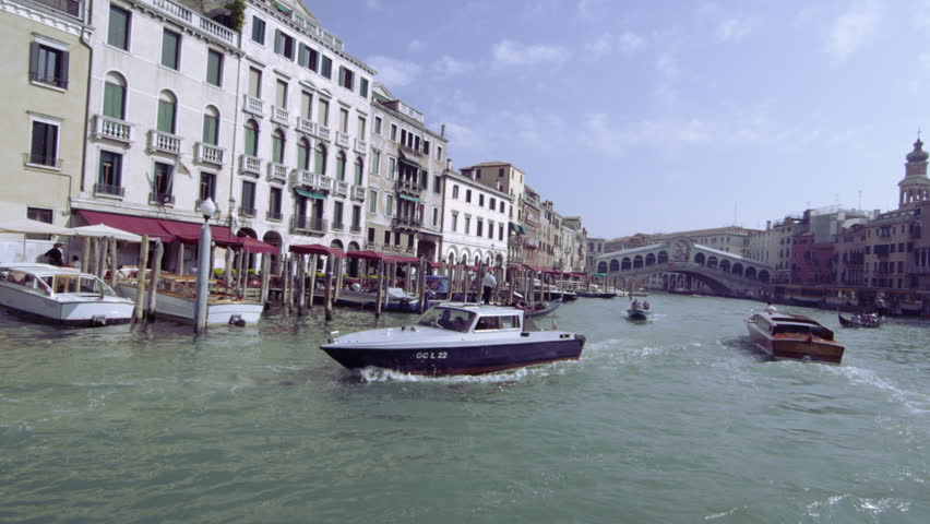 Business on the Grand Canal with Rialto Bridge in the background