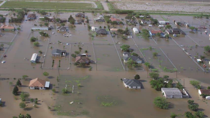 Aerial view of massive flooding after storm. Ideal for showing the devastation after storms like Hurricane Irma, Harvey, and Maria.