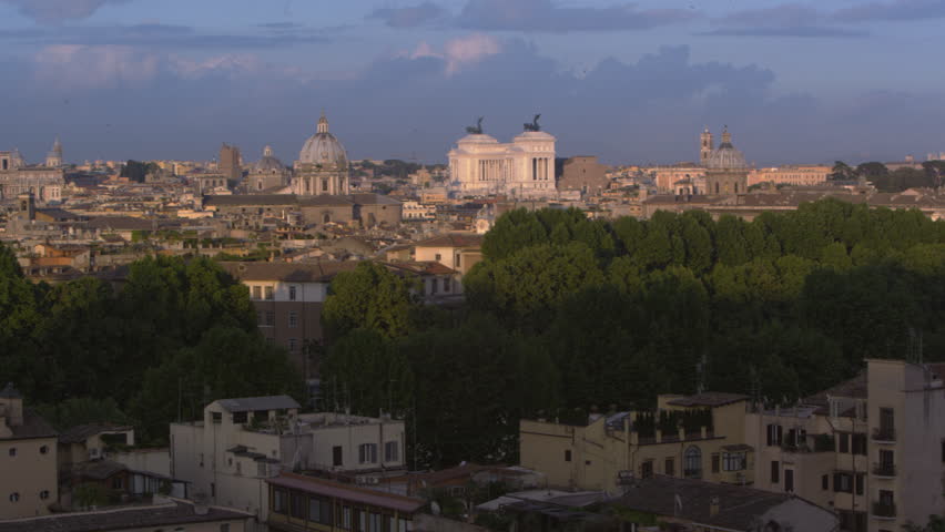 Slow pan of Rome, the Tiber and monuments