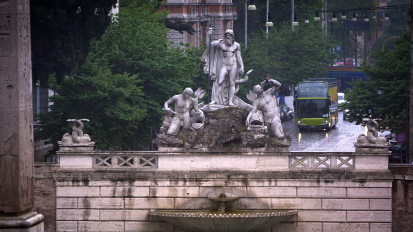 Slow motion of Fontana del Nottuno and obelisk on a rainy day