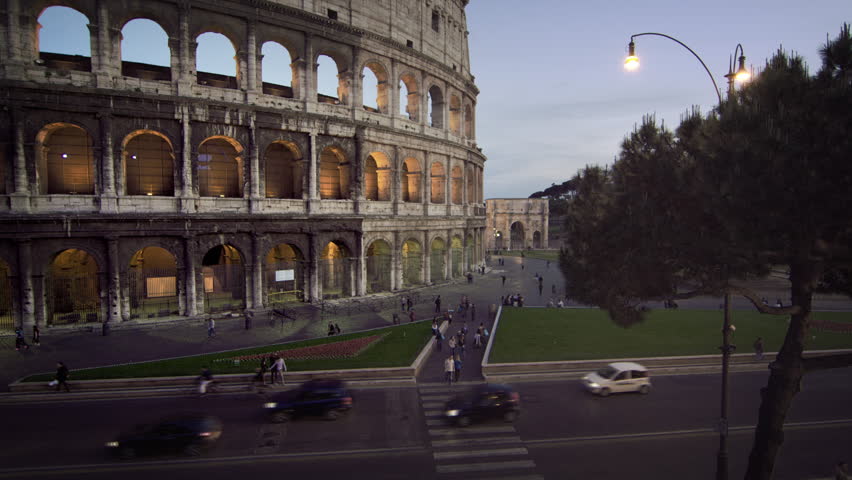 Lower Colosseum and Arch of Constantine and Italian street
