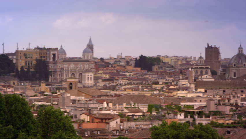 Rome skyline featuring St Peters basilica, Hotel Piazza Venezia and others