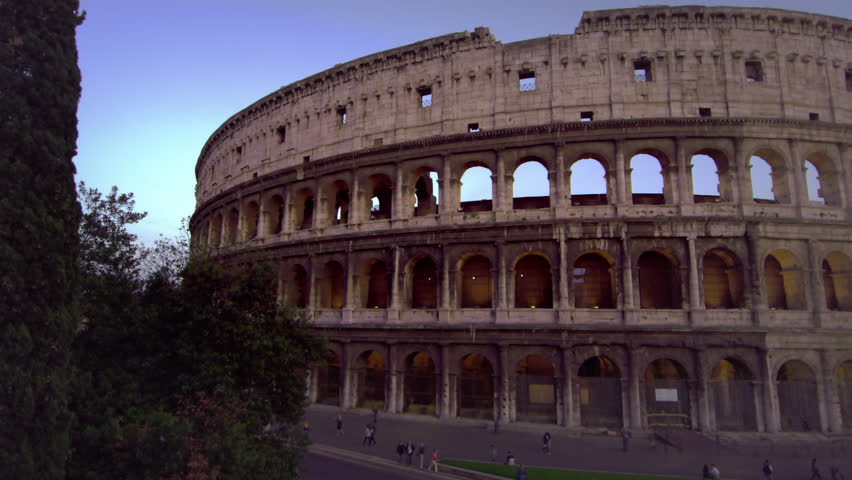 Slow pan of Colosseum and Constantine's Arch