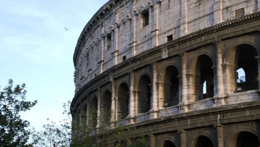 Close pan of arches in Roman Colosseum