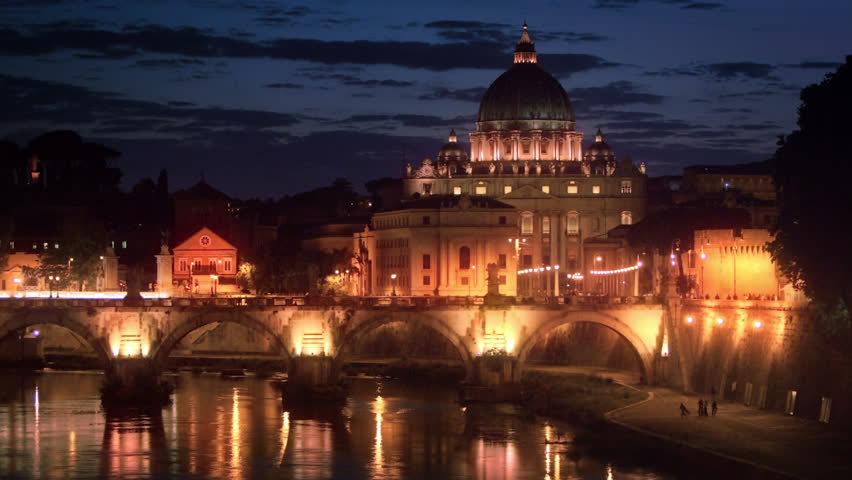 Still footage of Ponte Sant Angelo and dome of St Peters Basilica at night