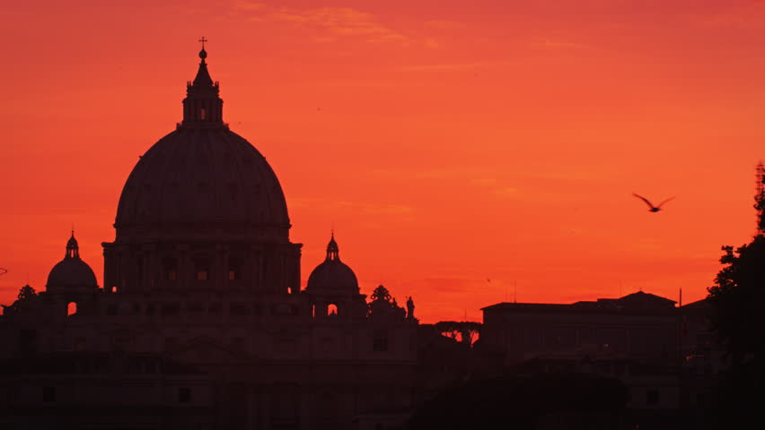 St Peters Basilica against a pink sunset