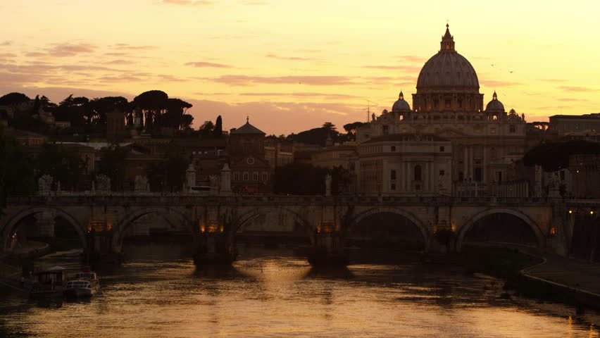 Still footage of Ponte Sant Angelo and dome of St Peters Basilica at sunset