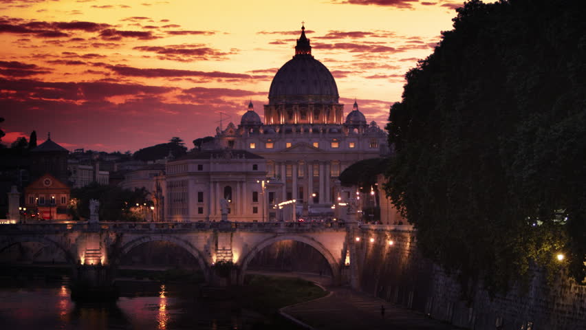 North side of the Ponte Sant Angelo and St Peters Basilica at sunset
