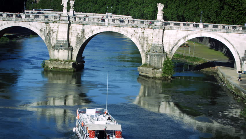 Barge approaches arch of Ponte Sant'Angelo