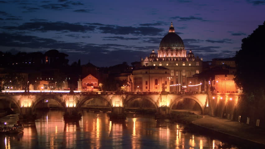 Tilt down footage of Ponte Sant Angelo and dome of St Peters Basilica