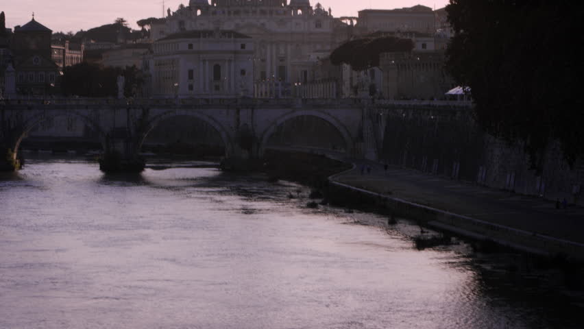 Footage of the dome of St Peter's Basilica from a bridge on the Tiber