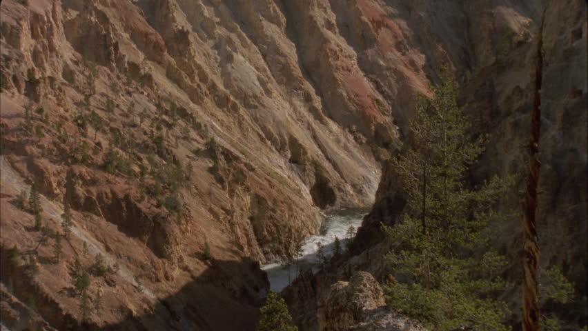 *canyon deep with river running through