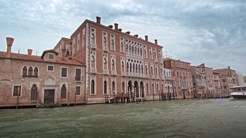 VENICE, ITALY - MAY 2, 2012: Slow motion, tracking shot of Grand Canal scenery