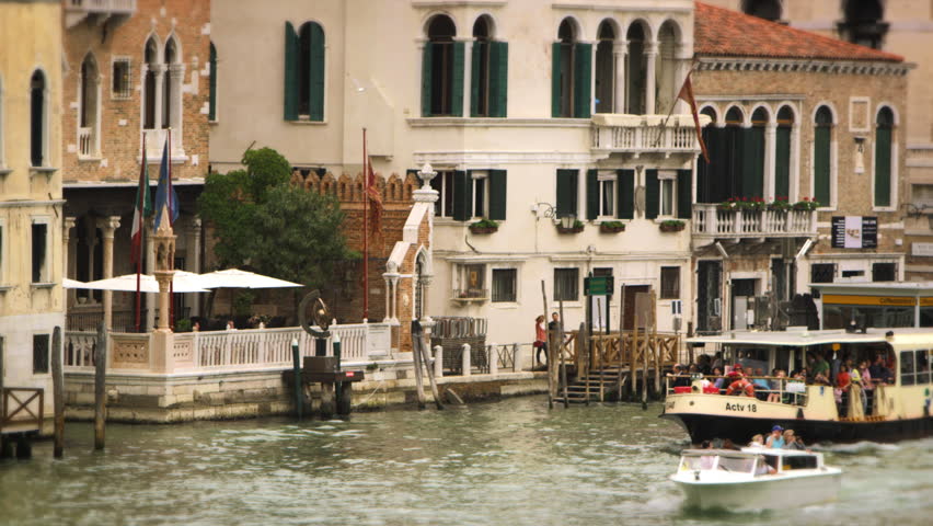 VENICE, ITALY - MAY 2, 2012: Boats and waterfront buildings in Venice