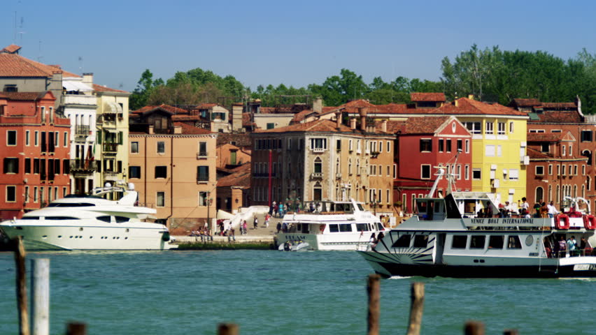 VENICE, ITALY - MAY 2, 2012: Slow motion shot of large boats on waterway