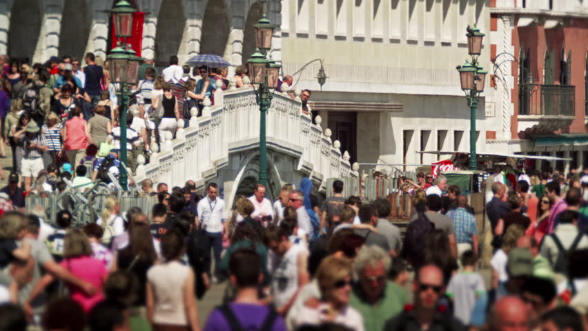 VENICE, ITALY - MAY 2, 2012: Slow motion shot of crowds walking across