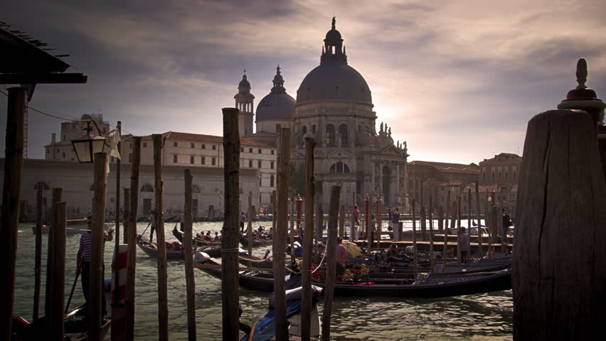 VENICE, ITALY - MAY 2, 2012: Gondola docks across from Santa Maria della Salute