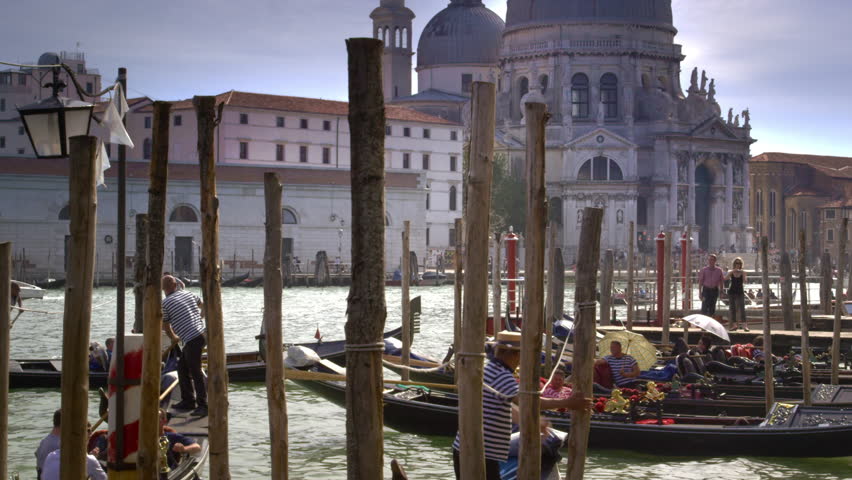 VENICE, ITALY - MAY 2, 2012: Gondolas in the docking area
