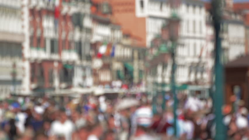 VENICE, ITALY - MAY 2, 2012: Slow motion shot of busy street with racking focus