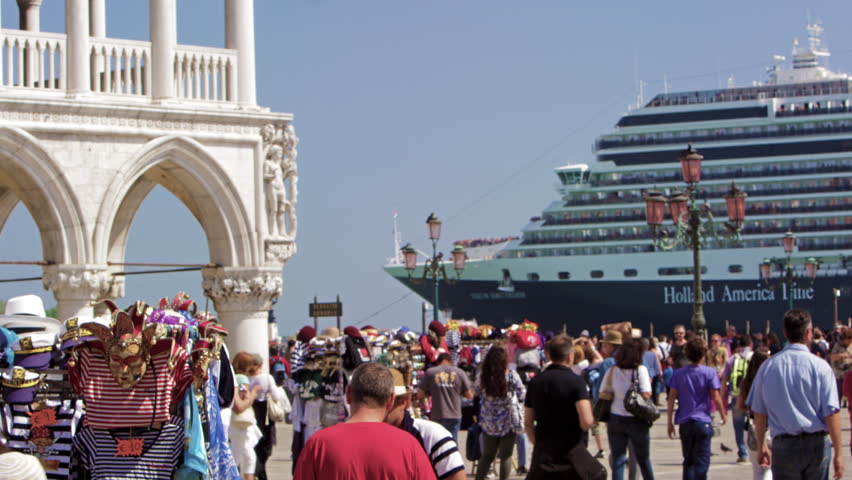 VENICE, ITALY - MAY 2, 2012: Slow motion shot of cruise ship pulling up near