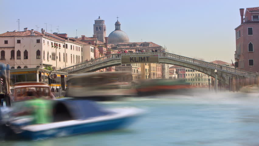 VENICE, ITALY - CIRCA MAY 2012: Time-lapse of the Scalzi bridge and water