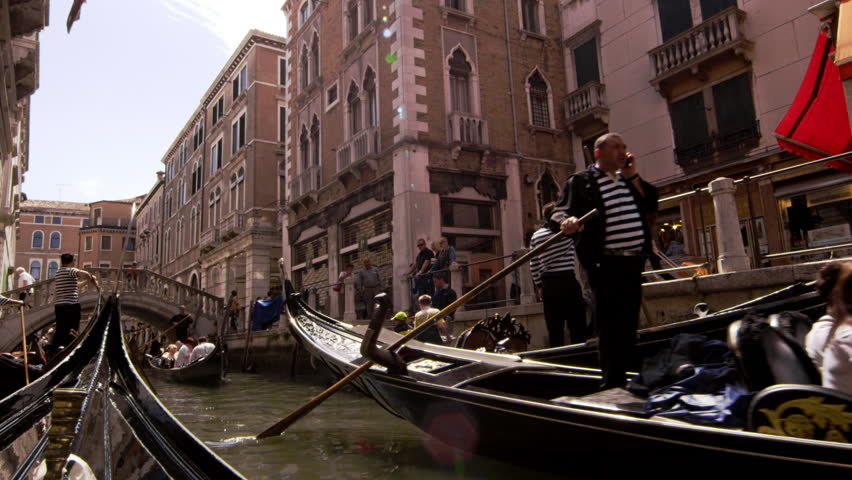 VENICE, ITALY - MAY 2, 2012: Busy canal in slow motion