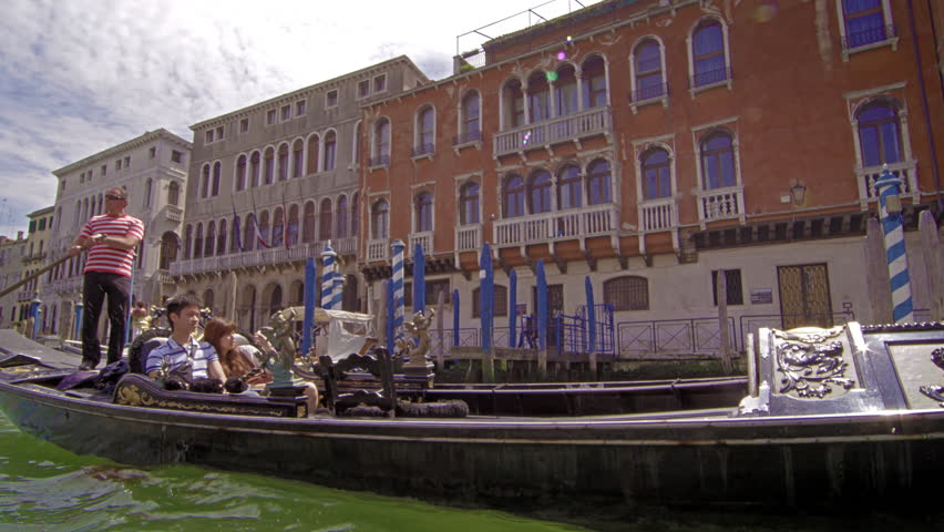 VENICE, ITALY - MAY 2, 2012: Gondolier ride in slow motion