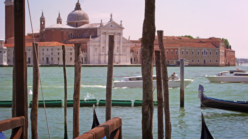 VENICE, ITALY - MAY 2, 2012: Slow motion shot of Grand Canal and the Church of