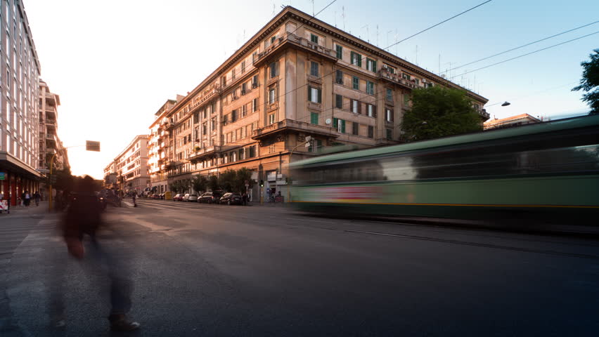 ROME - CIRCA MAY 2012: Time-lapse of busy traffic on a street corner in Rome,