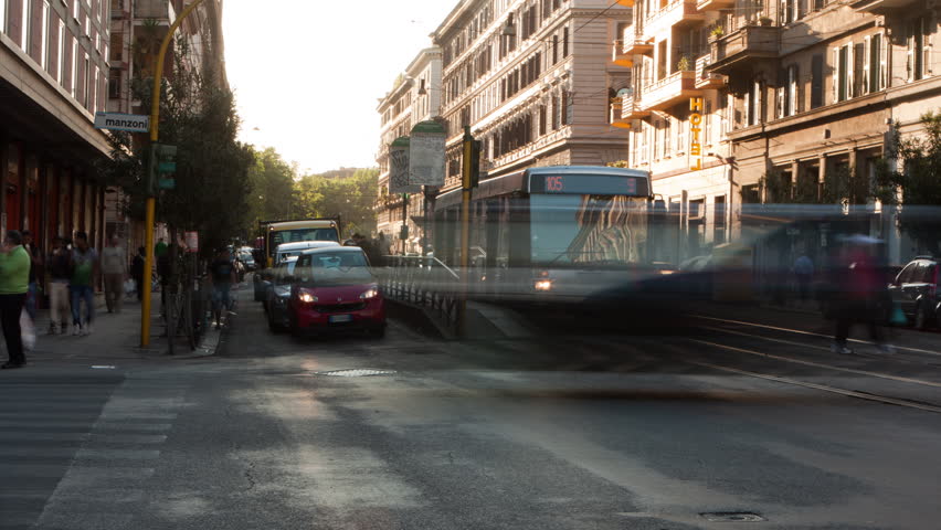 ROME - CIRCA MAY 2012: Time-lapse of a busy street and city trolley stop in