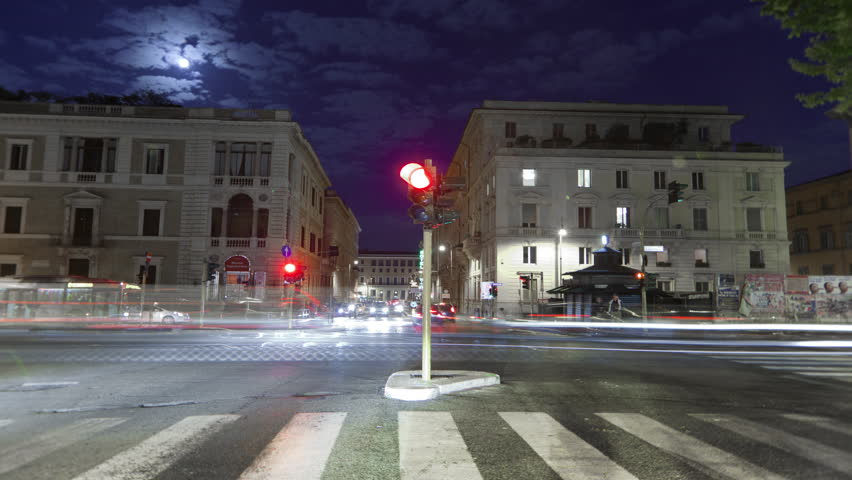 ROME - CIRCA MAY 2012: Night time time-lapse of a busy street in Rome.