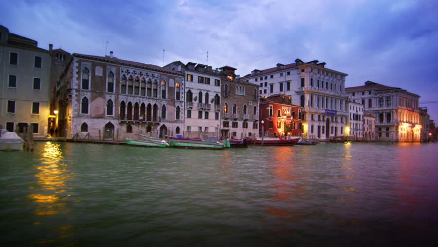 VENICE, ITALY - MAY 2, 2012: Tracking shot of majestic buildings on the Gran