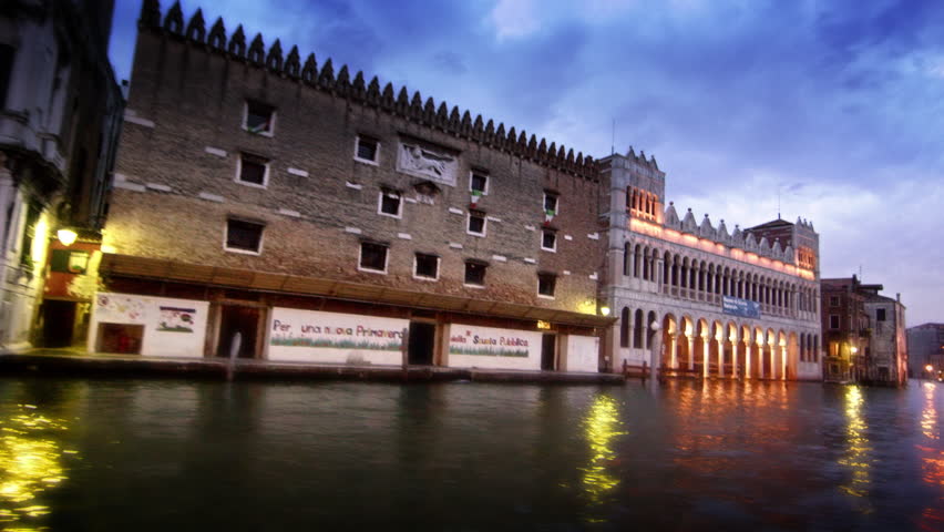 VENICE, ITALY - MAY 2, 2012: A large, ornate building on the Grand Canal