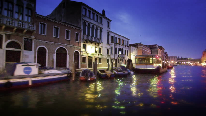 VENICE, ITALY - MAY 2, 2012: Tracking shot of the Grand Canal and its buildings