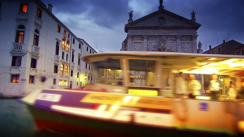 VENICE, ITALY - MAY 2, 2012: Water taxi passes in front of San Stae