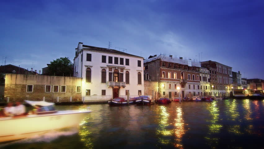 VENICE, ITALY - MAY 2, 2012: Motor boat and buildings on the Grand Canal