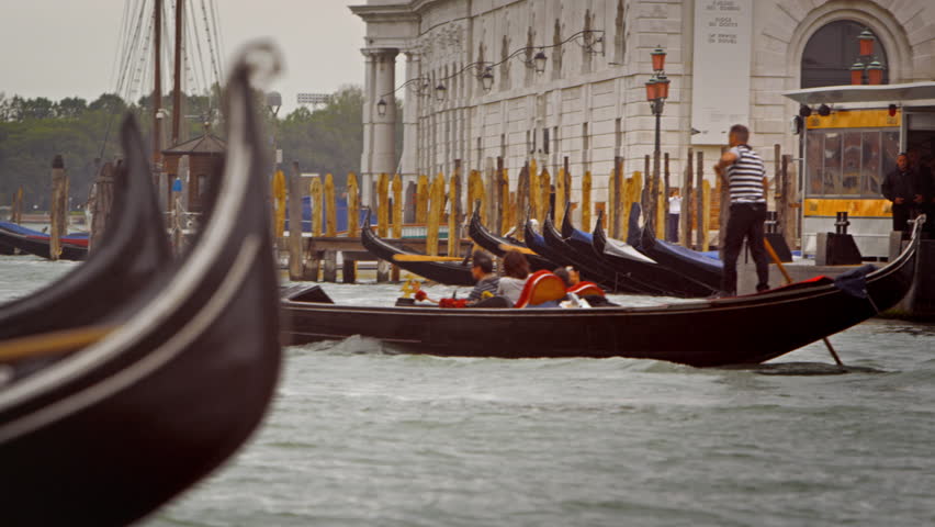 VENICE, ITALY - MAY 2, 2012: Gondola close-up with rack focus on a Venetian