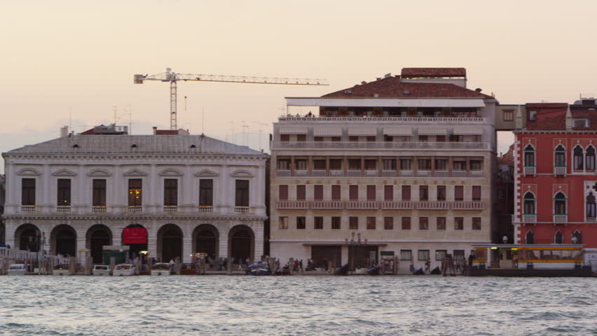 VENICE, ITALY - MAY 3, 2012: Panning shot of the wharf along the San Marco canal
