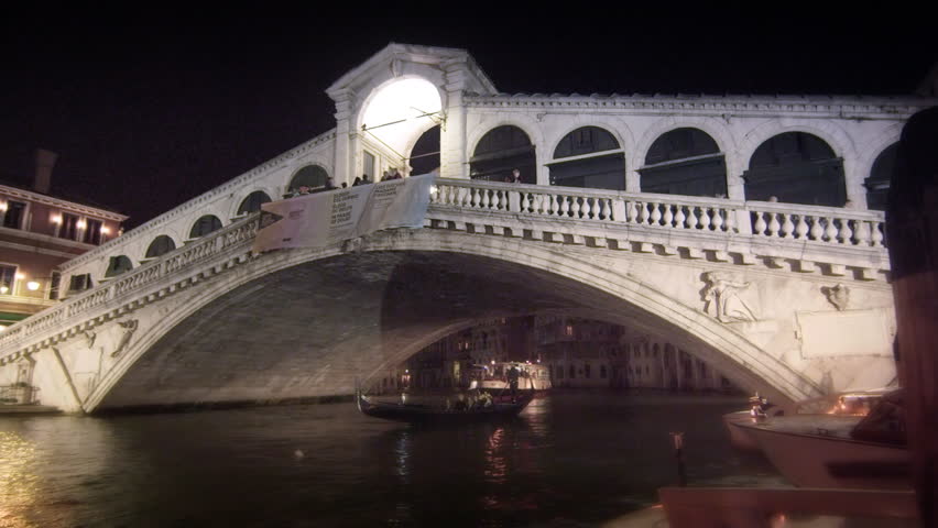 VENICE, ITALY - MAY 2, 2012: Gondola under Rialto Bridge