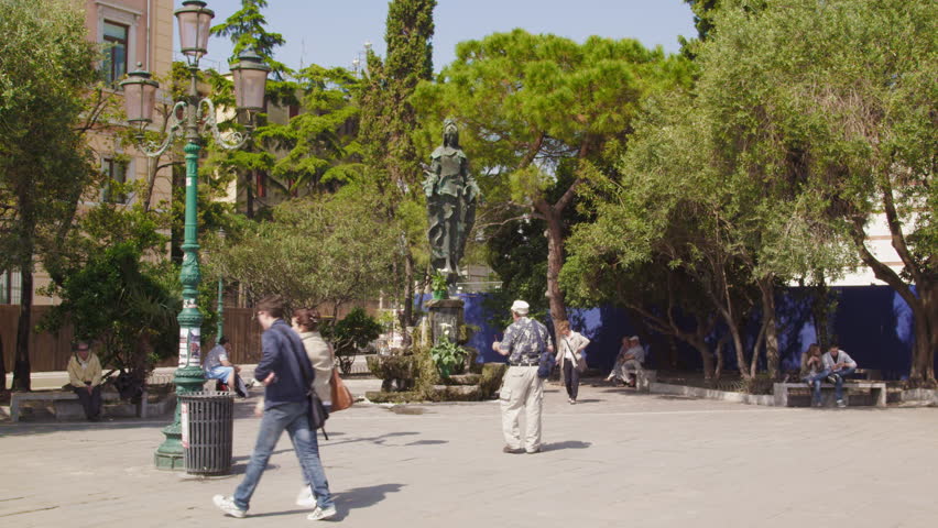VENICE, ITALY - MAY 4, 2012: Slow motion shot of people walking outside the