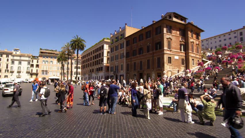 ROME, ITALY - MAY 5, 2012: Pan of plaza in front of Trinity dei Monti in slow
