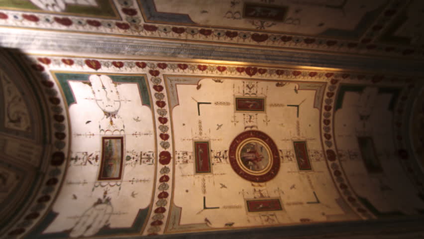 ROME, ITALY - MAY 5, 2012: Tilt down from ceiling in Vatican museum