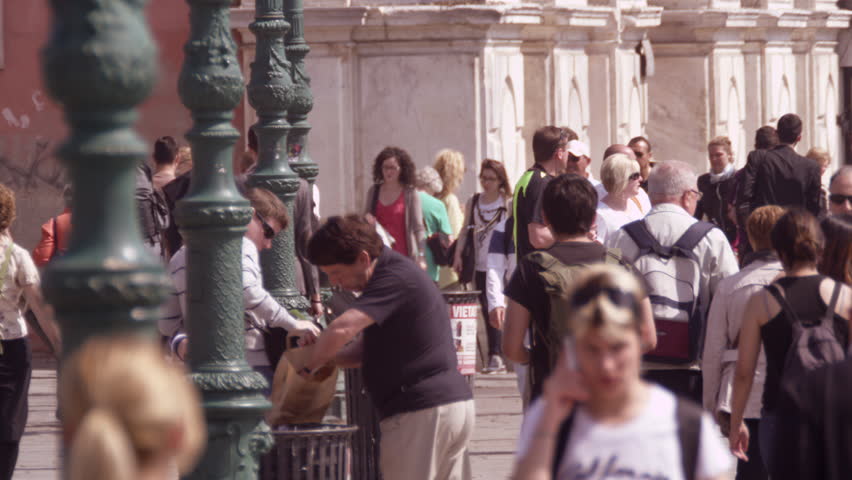 VENICE, ITALY - MAY 4, 2012: Slow motion shot of crowded walkway in front of the