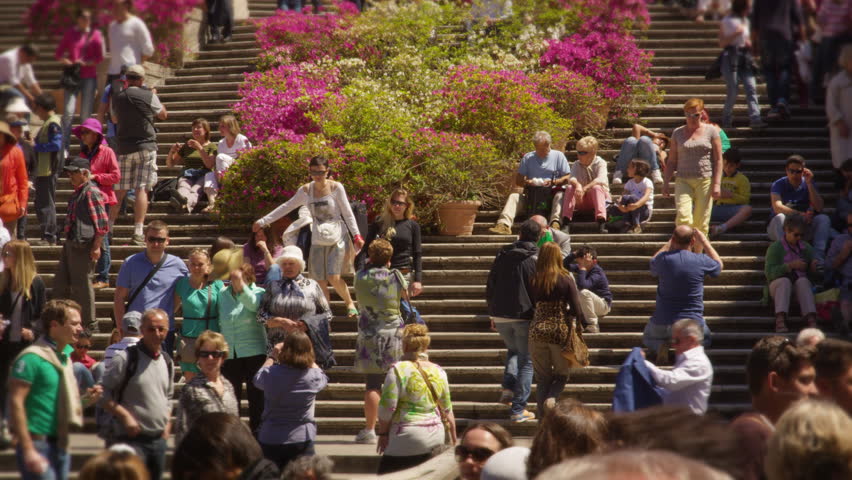 ROME, ITALY - MAY 5, 2012: Slow motion still shot of crowded stairs at Trinity